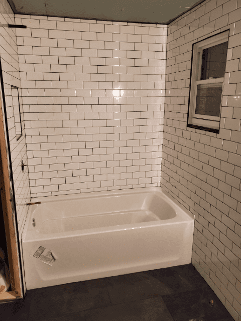 Renovated shower and bathtub in bathroom | Austin Drain Cleaning Company